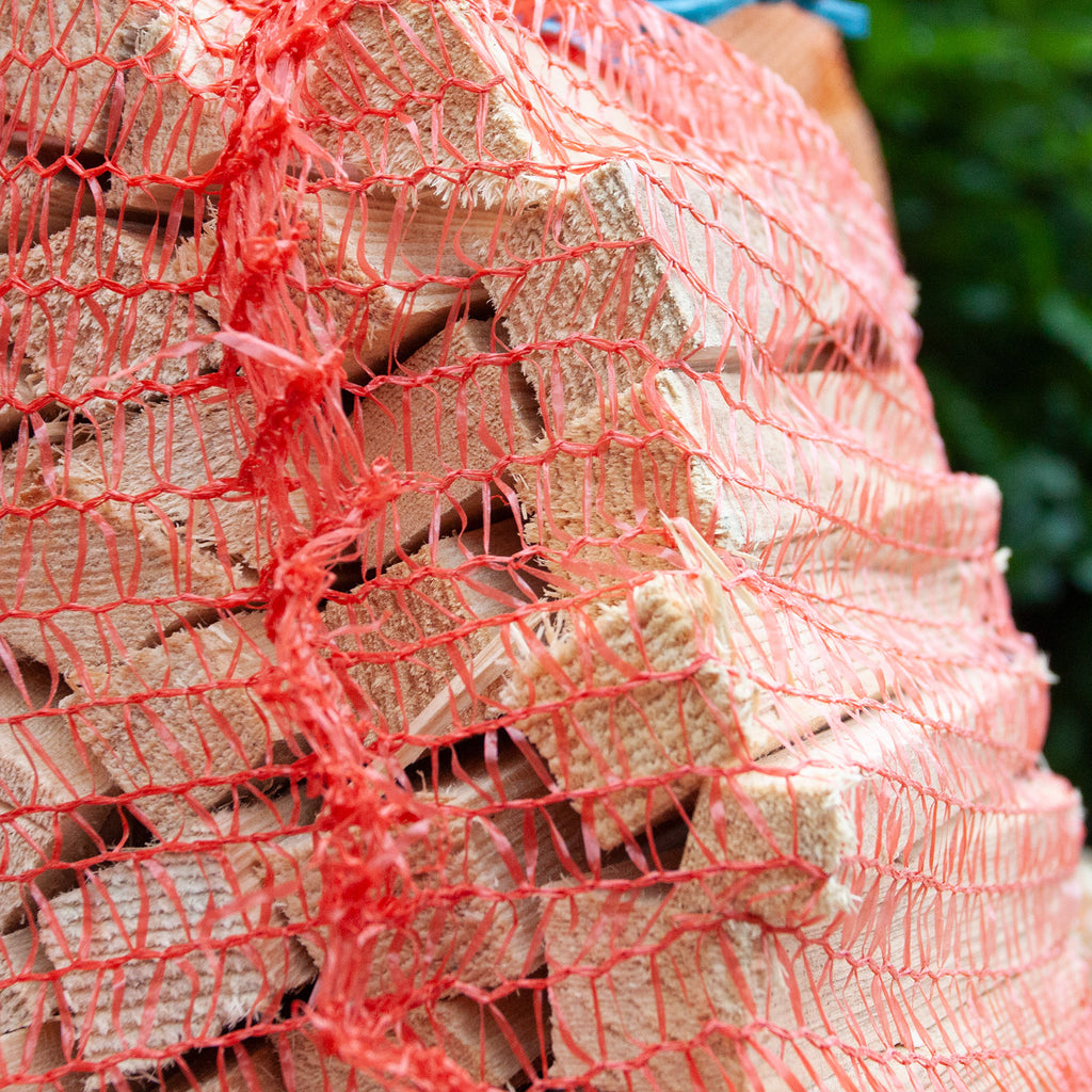 Kindling wood in handy net bags; fast lighting and clean burning